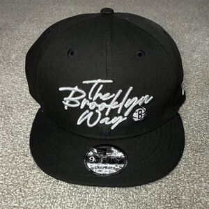 New Era Black Cap with White Embroidery